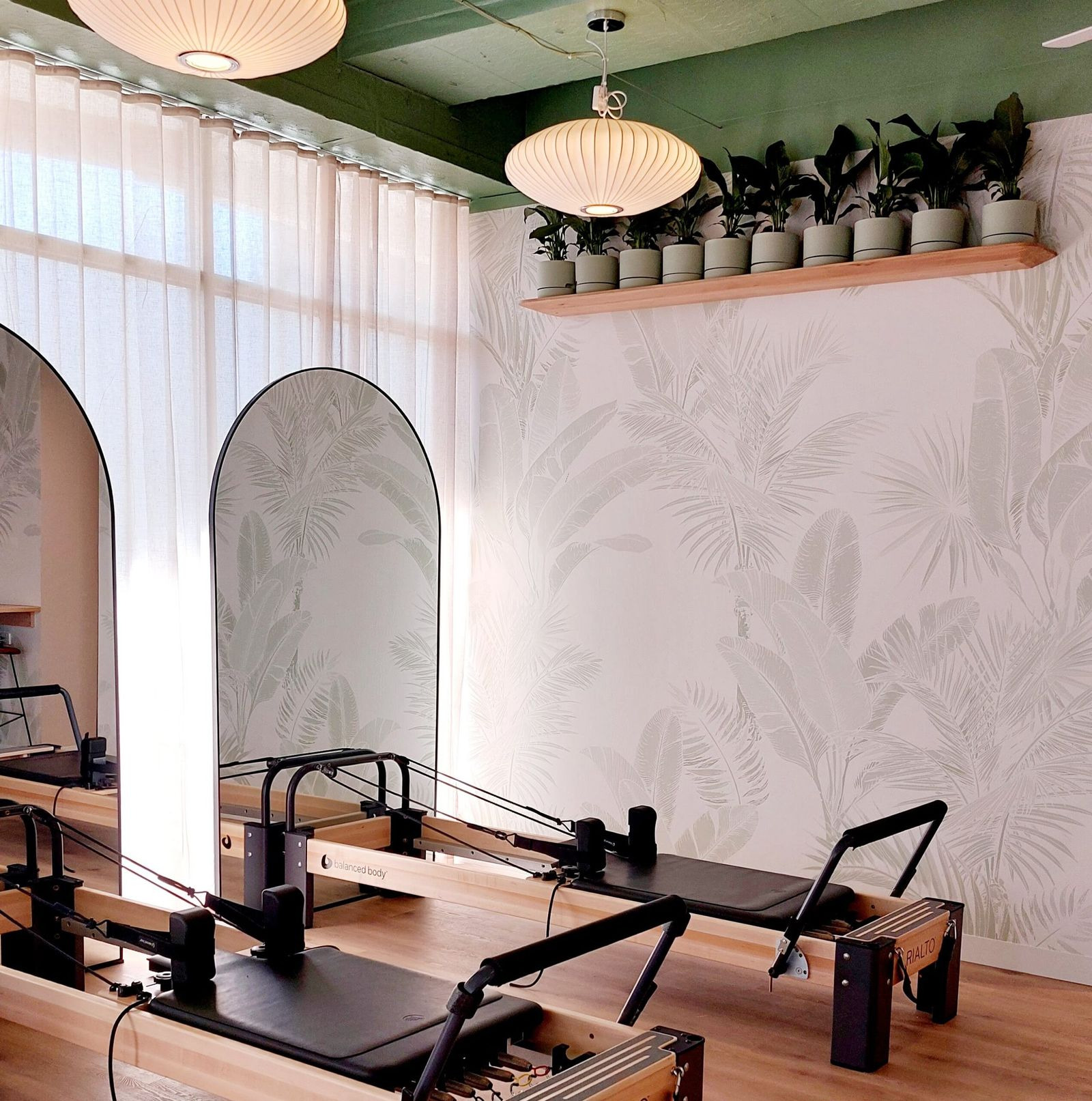 Reformers under the arches at our Dendy Village clinic in Brighton